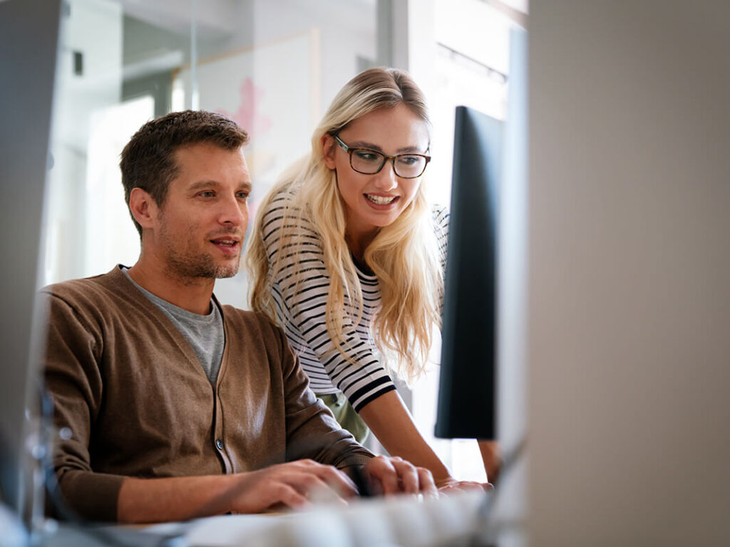 Programmers working cooperating at IT company developing apps. Business people technology concept